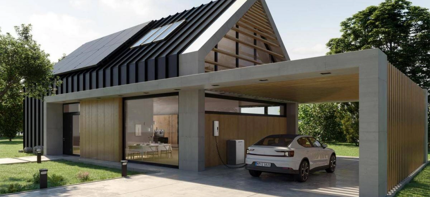 Einfamilienhaus mit Photovoltaikanlage, Carport mit Wallbox und Stromspeicher zum Aufladen des E-Autos.
