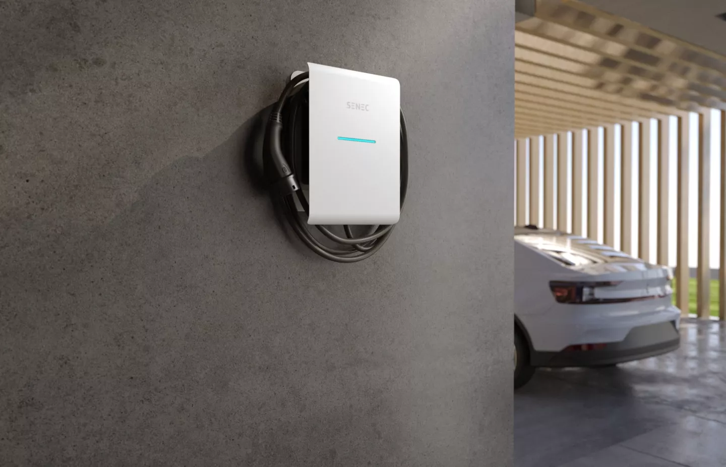 SENEC.Wallbox pro s on a wall next to e-car